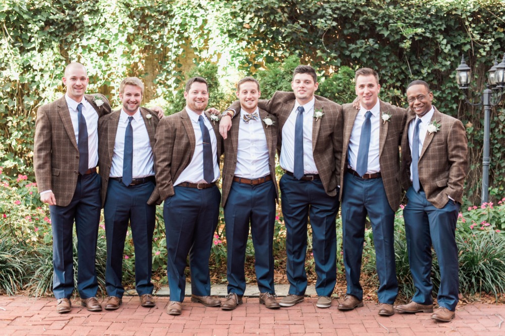 groomsmen in navy and tweed