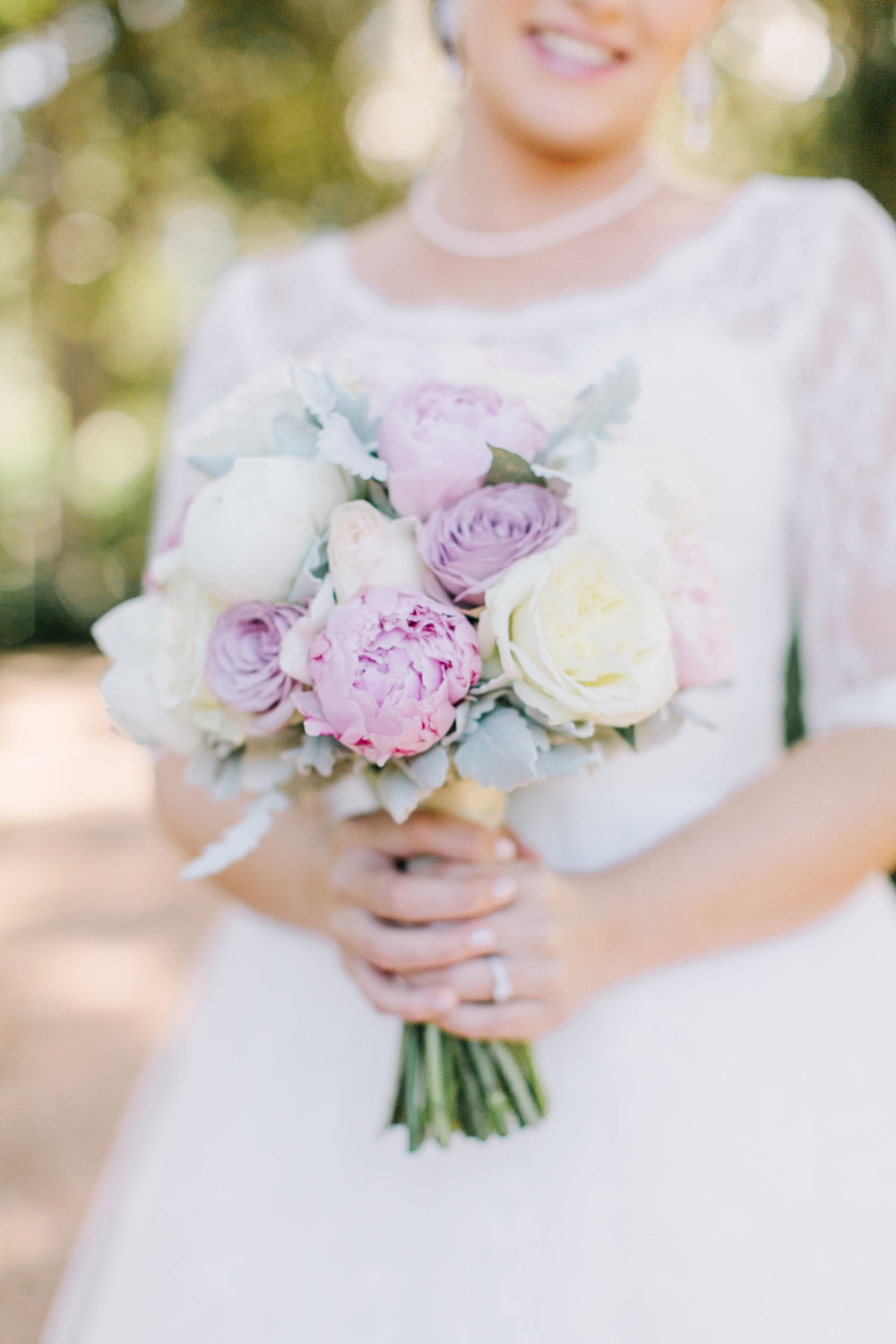 purple and white peony and rose bouquet