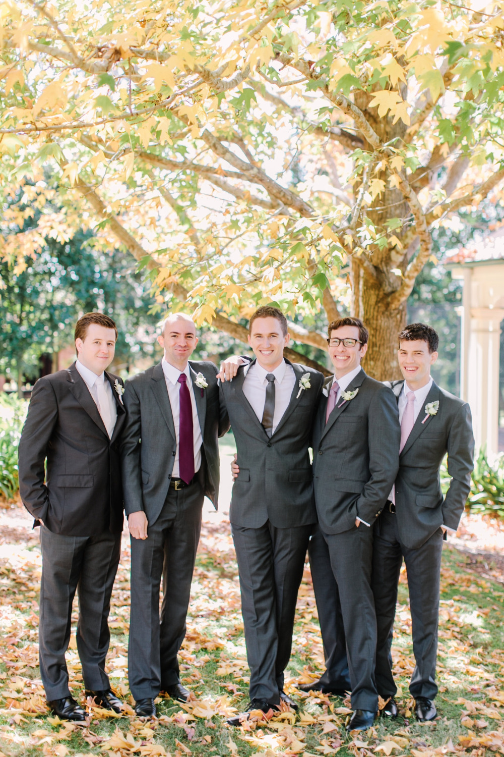 classic grey groomsmen with purple ties