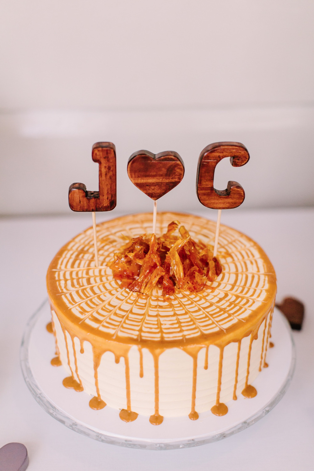 caramel wedding cake with DIY topper