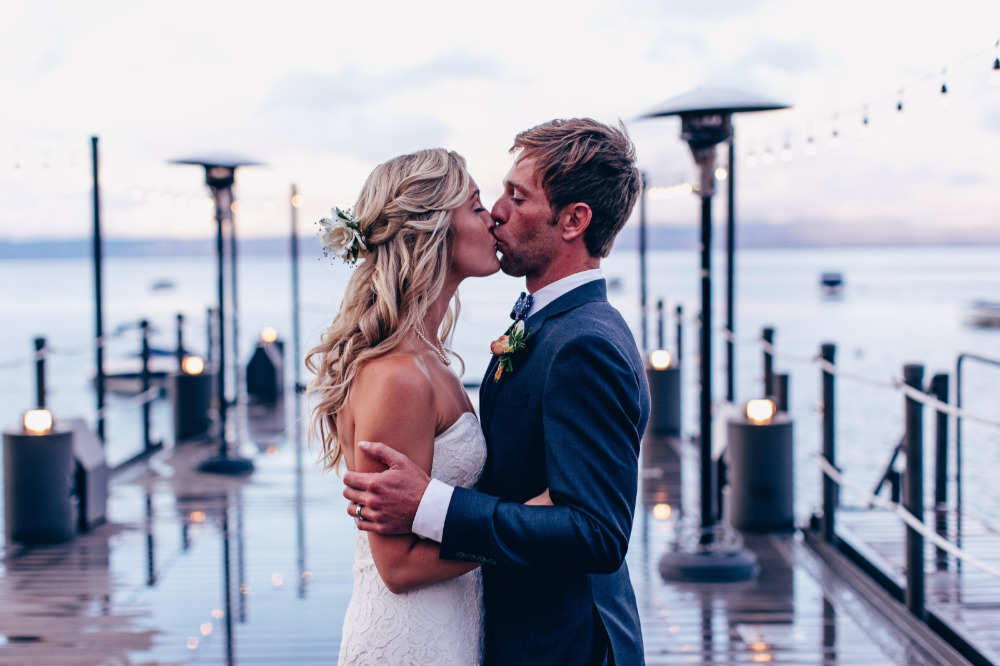 a wedding kiss on the docks