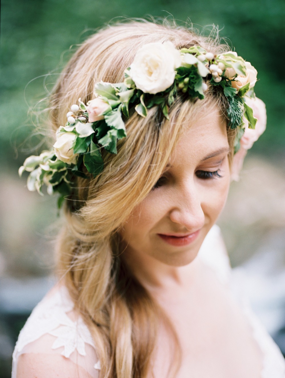 Bride with flower crown wedding hairstyle close up