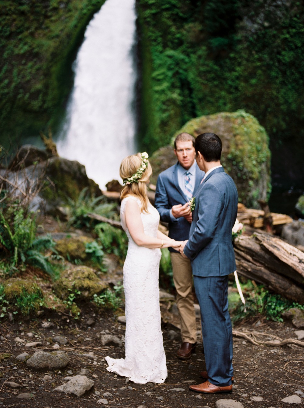 Wedding ceremony by a waterfall