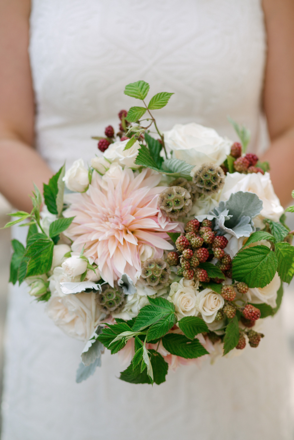 dahlia roses and berries wedding bouquet