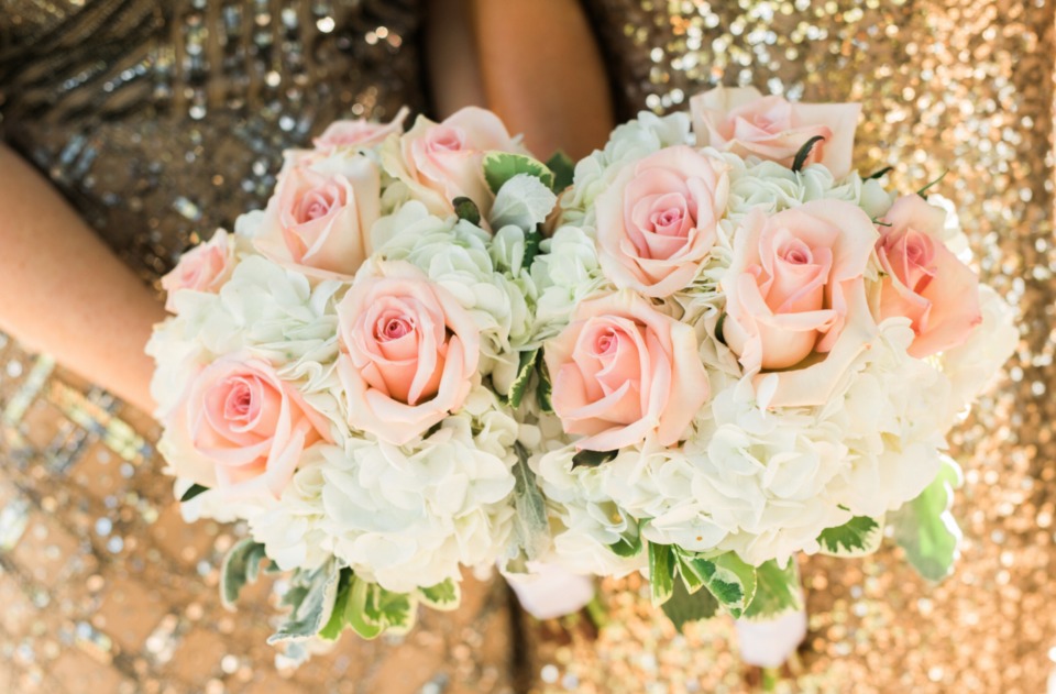pink rose and white hydrangea bouquets