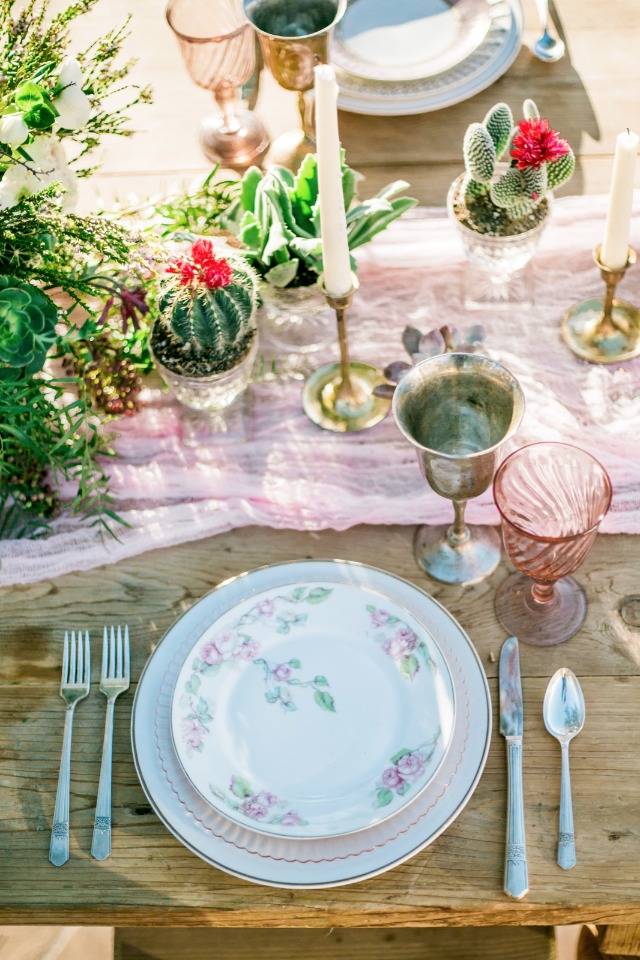 table decor with mini cacti and soft pink details