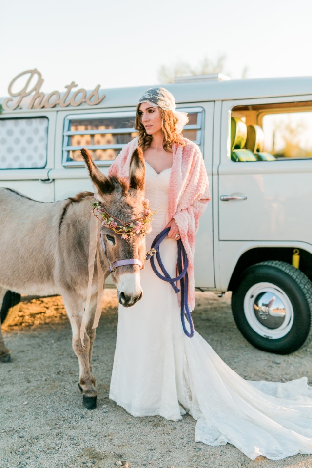 bohemian bride ready for anything with her faithful burrow by her side.