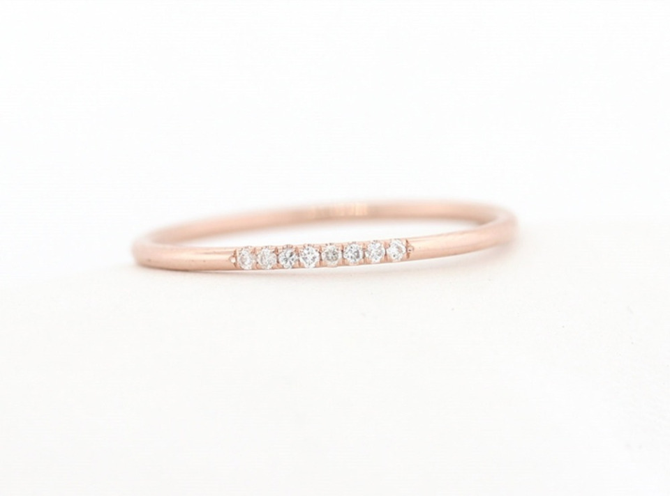 Elegant thin rose gold ring with diamond row detail