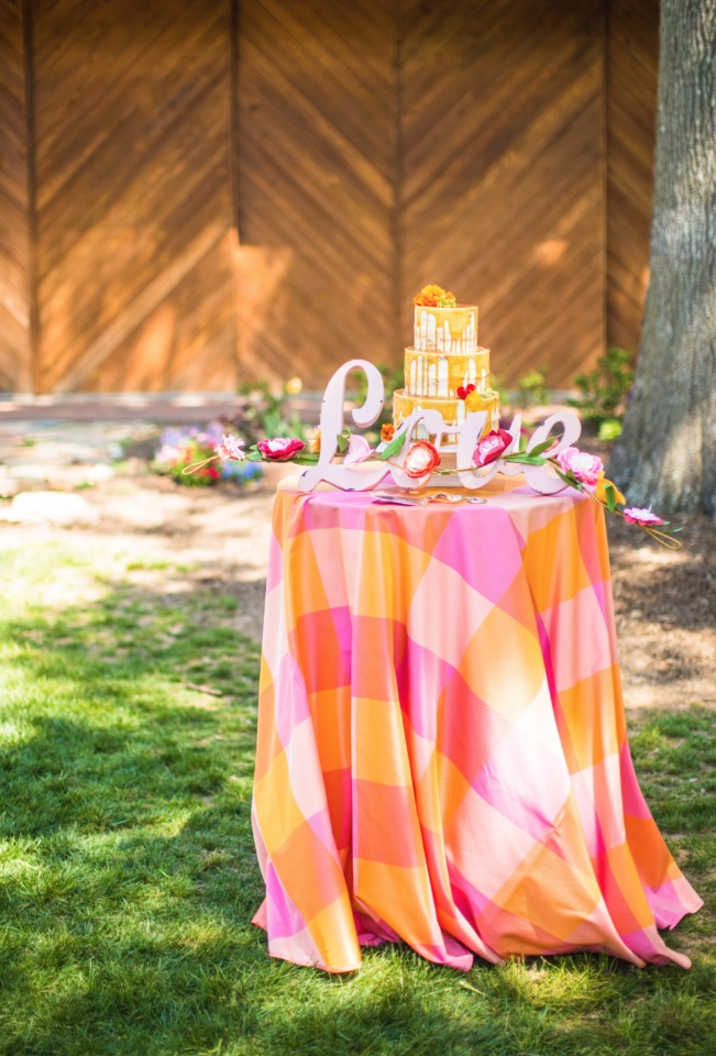 love this wedding cake table and how bright and happy it is