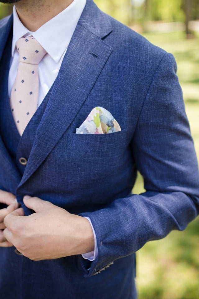 watercolor inspired pocket square with navy suite and blush polka dot tie