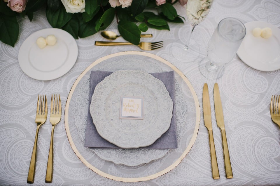 gold and grey table setting