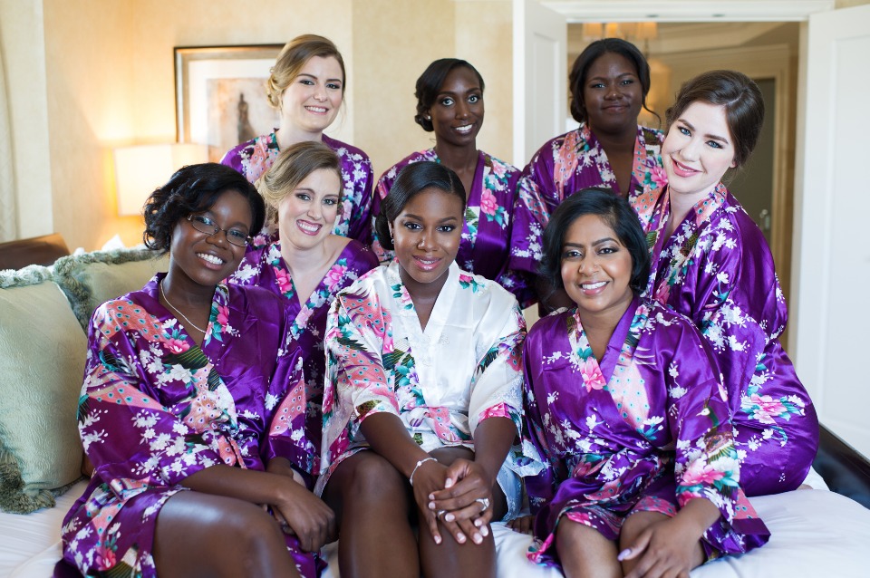 The bride and her bridesmaids getting wedding ready