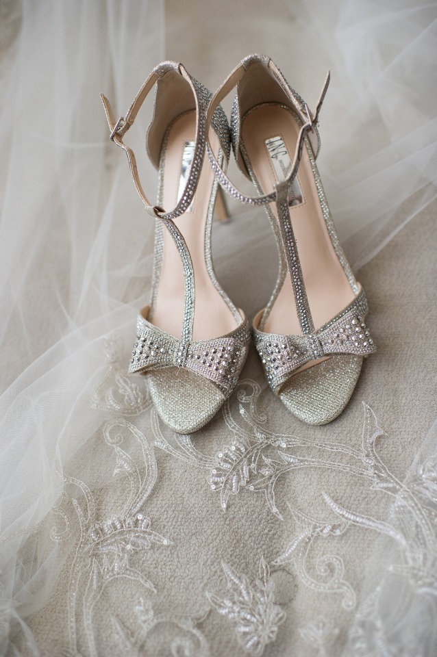 Sparkly silver high heel bridal shoes with rhinestone bow