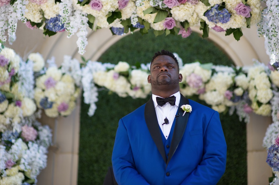 sweet shot of the groom seeing his bride for the first time