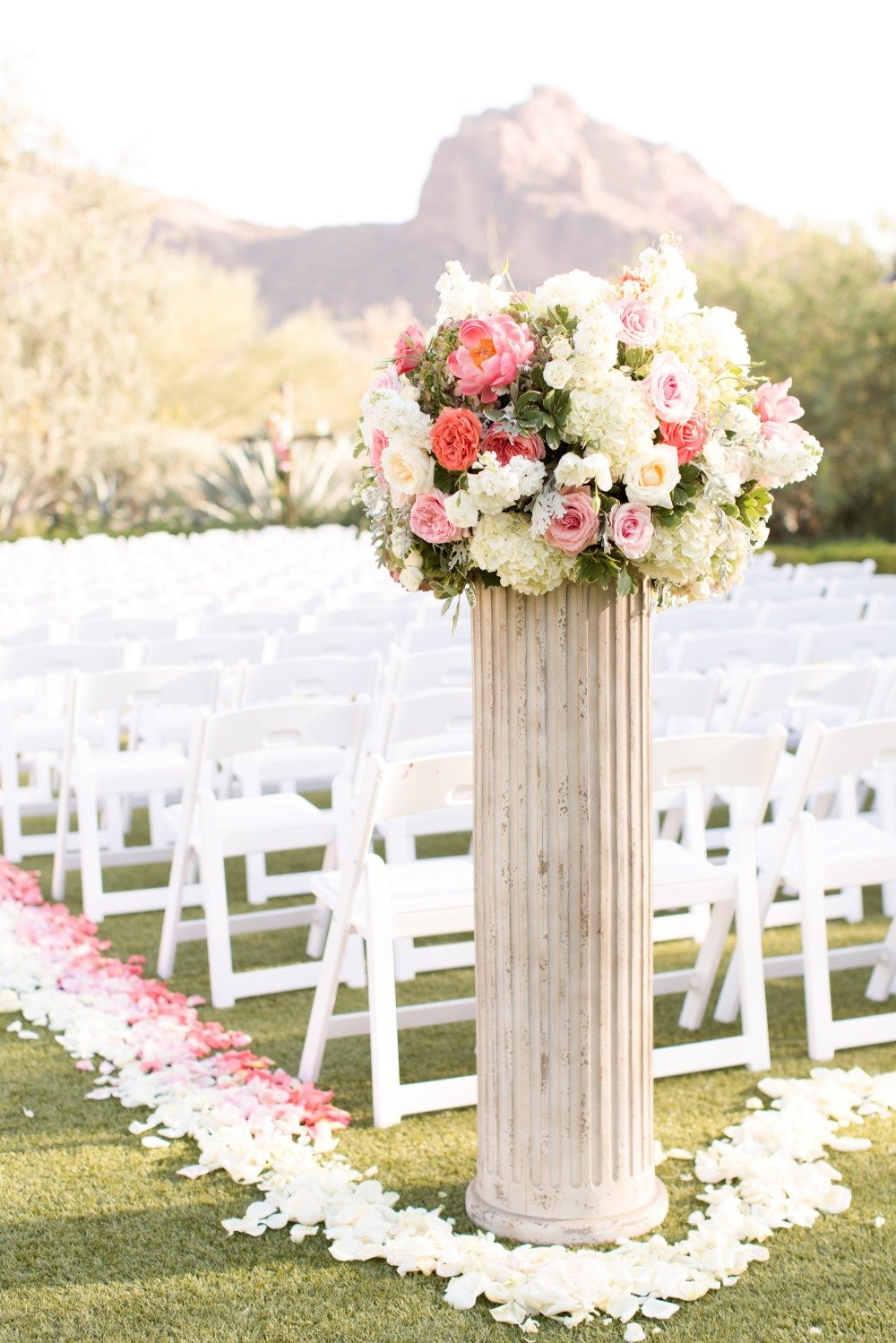 Wedding ceremony flower arrangement idea