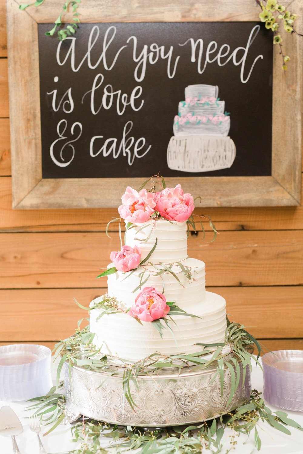 Pink peony topped wedding cake