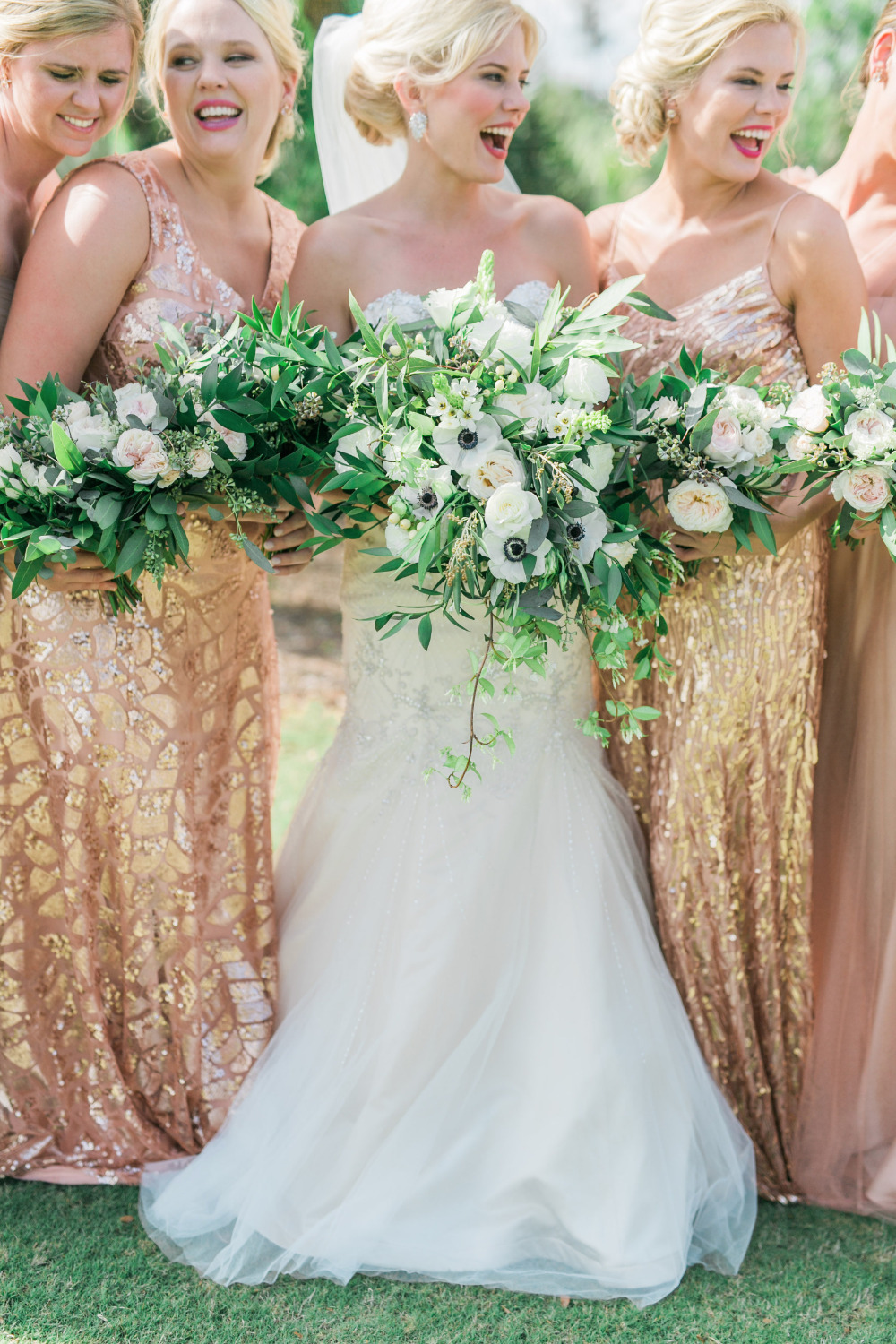 fun bridesmaids photo with pink and gold dresses