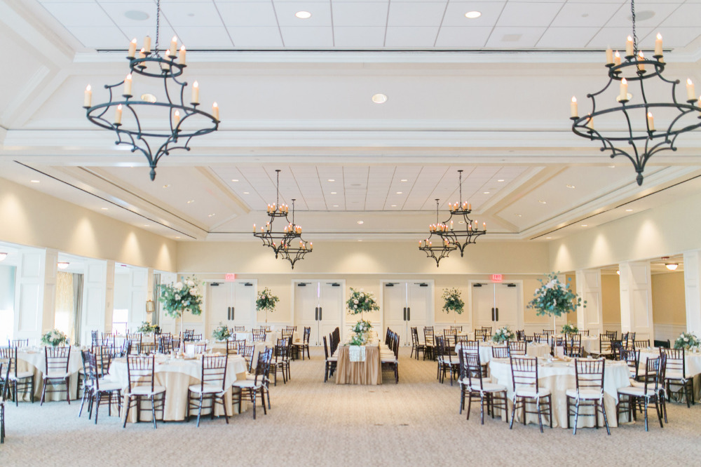 wedding reception with pretty candle chandeliers