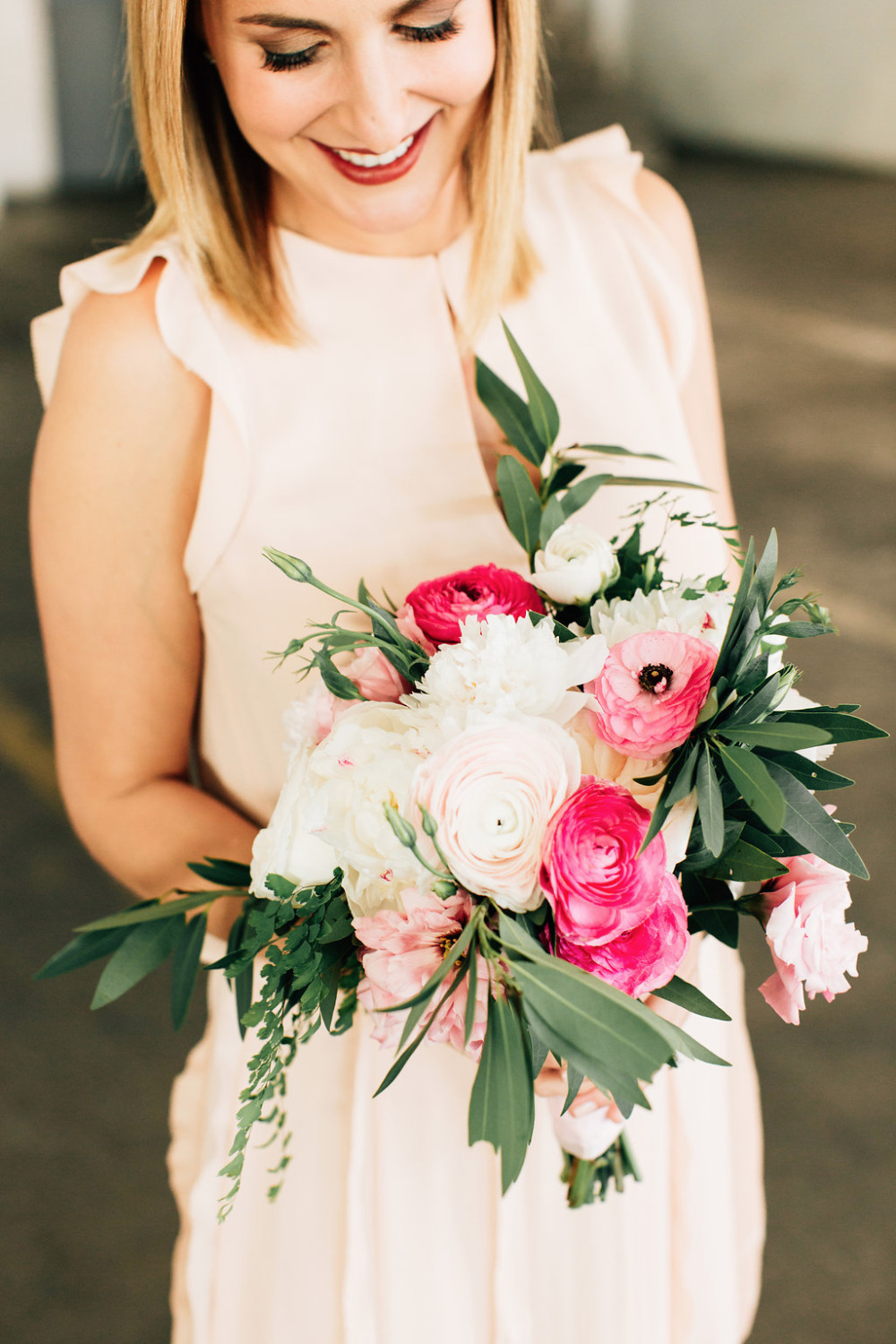 pink bridesmaids dresses with bouquet