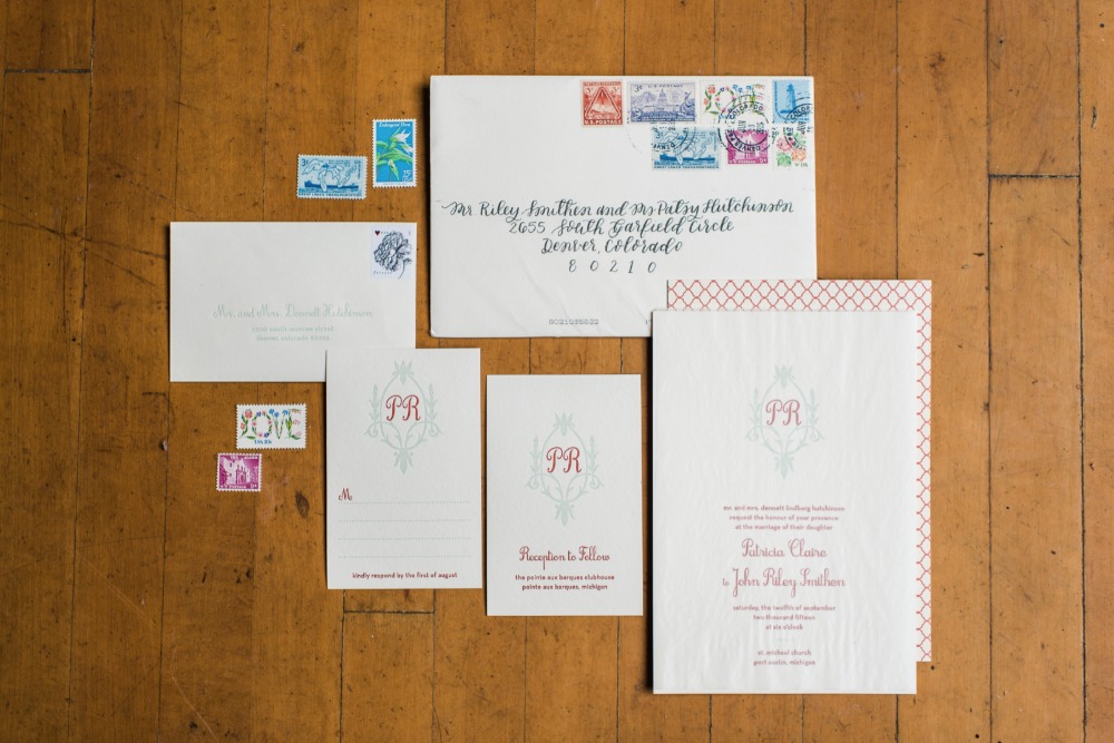 Rustic wedding stationery with monogram PR and postage stamps