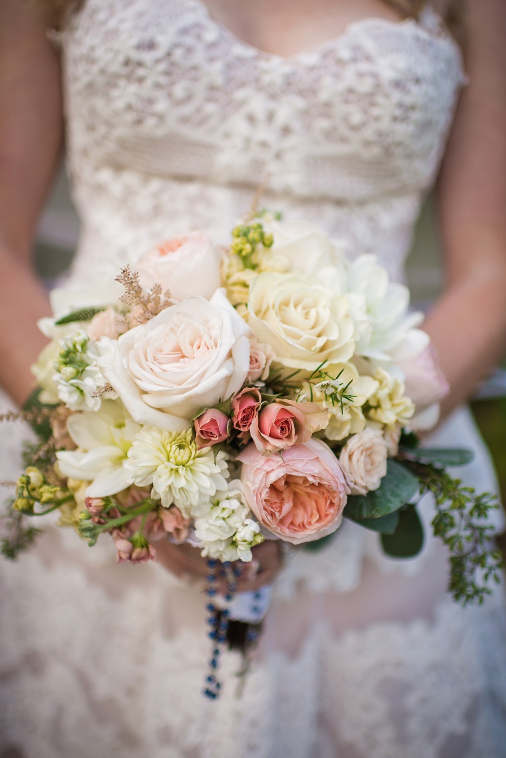 Bridal bouquet:  Peach and ivory roses, elegant blooms