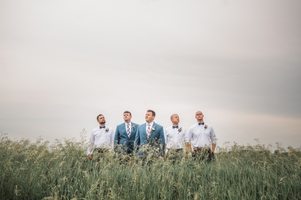 groom and his men out in a field