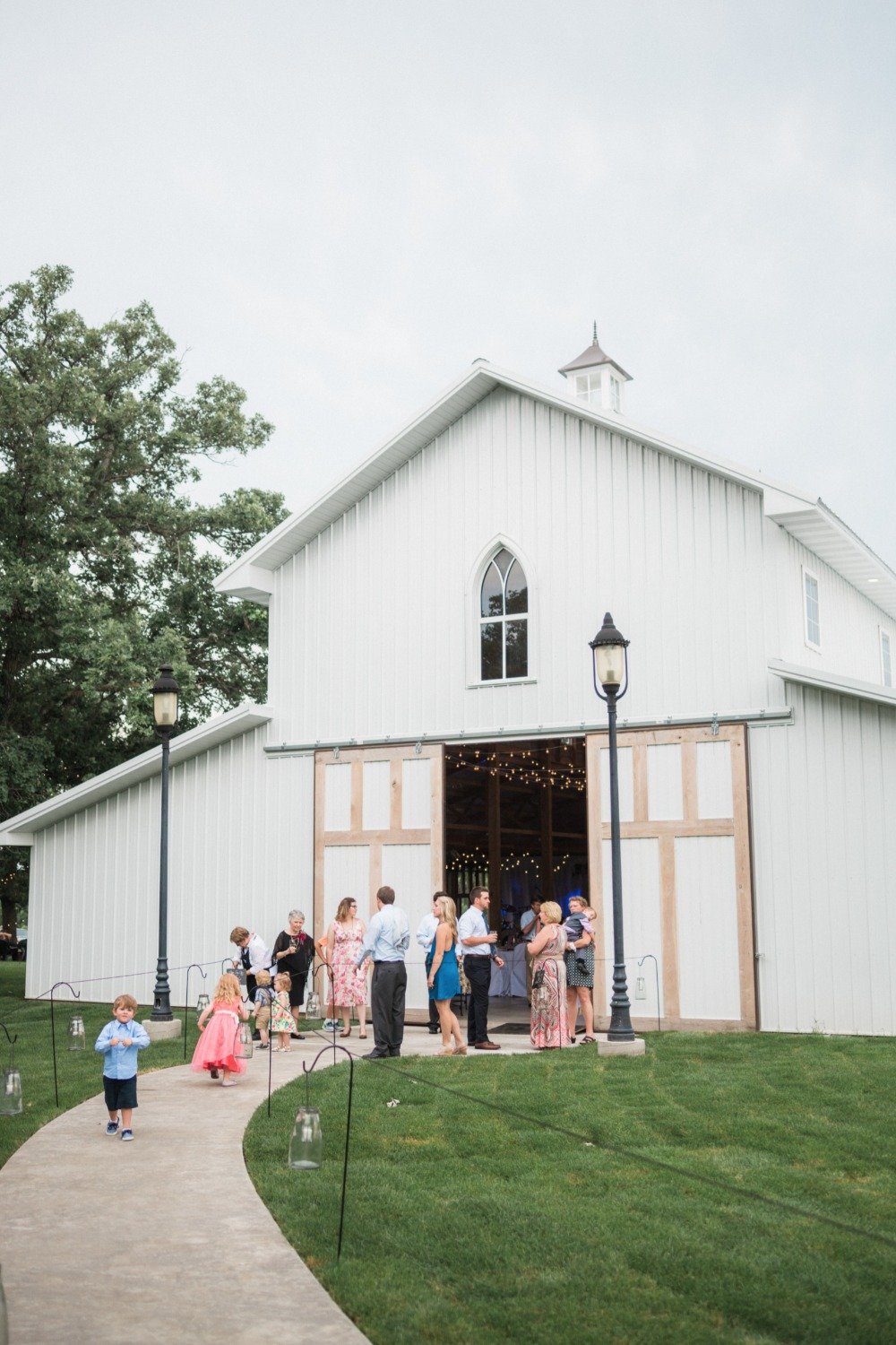 rustic white barn wedding reception