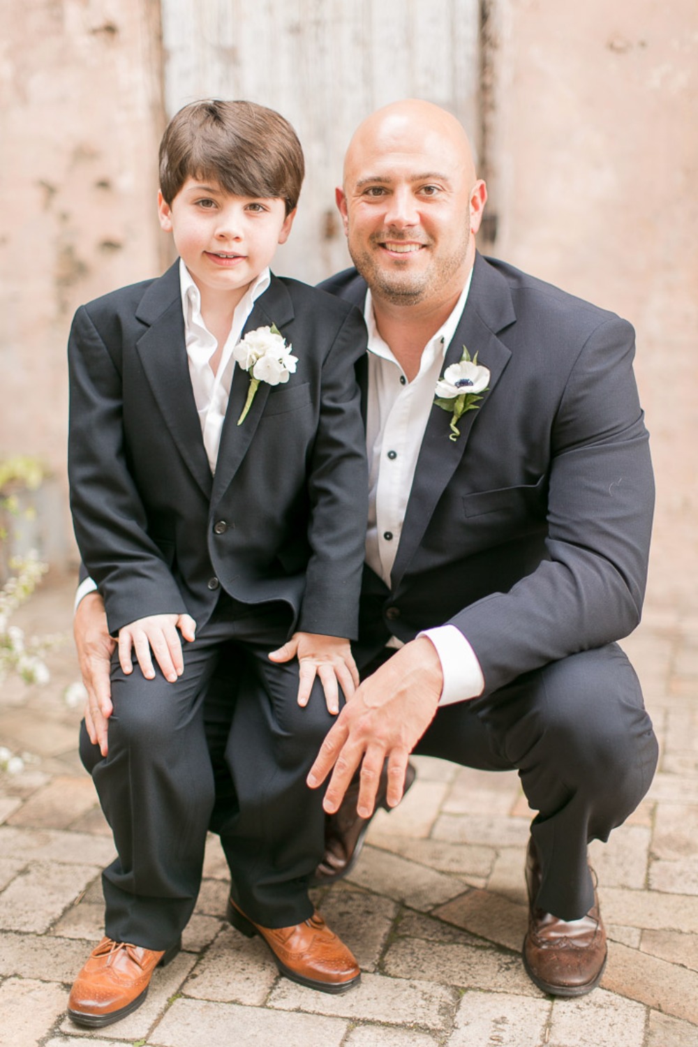 dapper ring bearer in a suite
