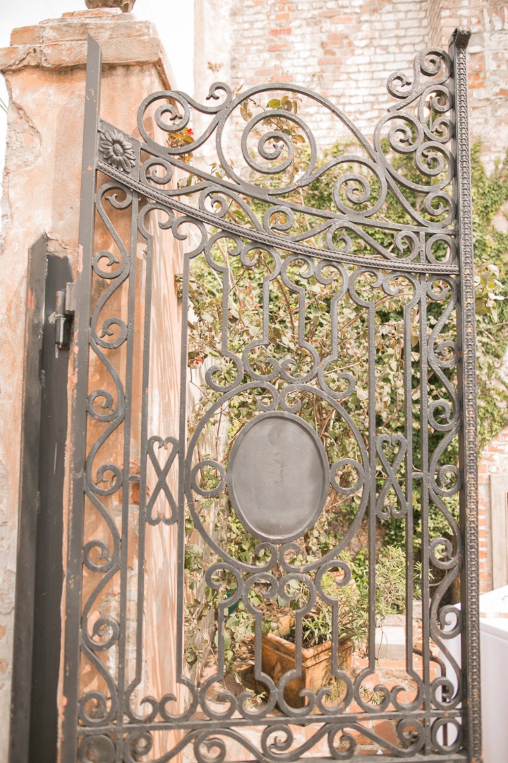 rot iron scrolling fence