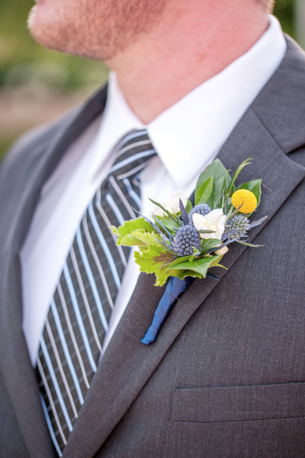 Yellow and blue boutonniere