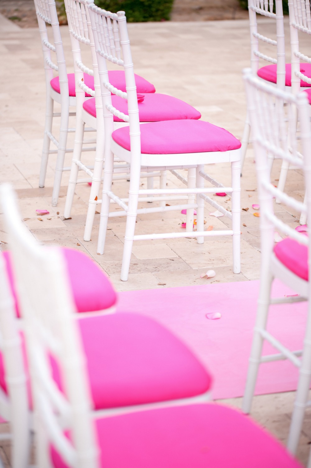 Pink and white ceremony chairs