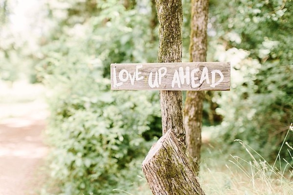 love up ahead wedding sign