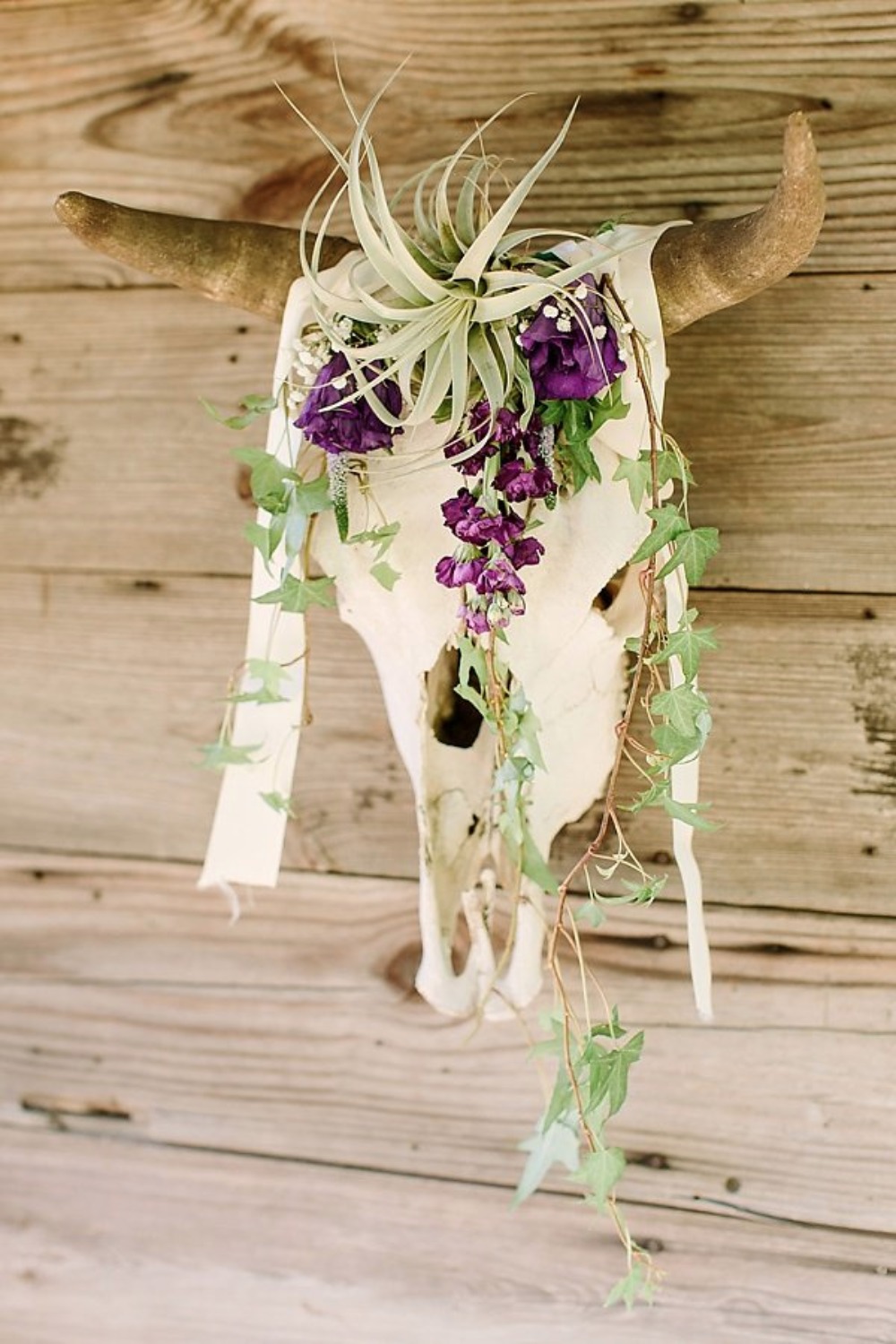 flower accented skull wedding decor