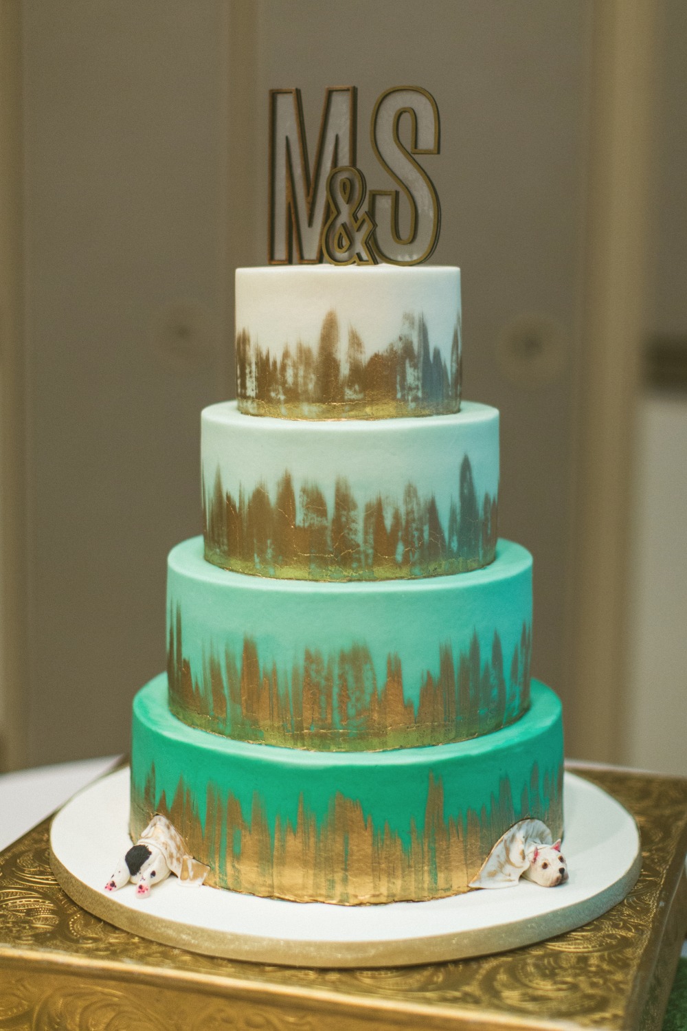 Ombre teal and gold wedding cake