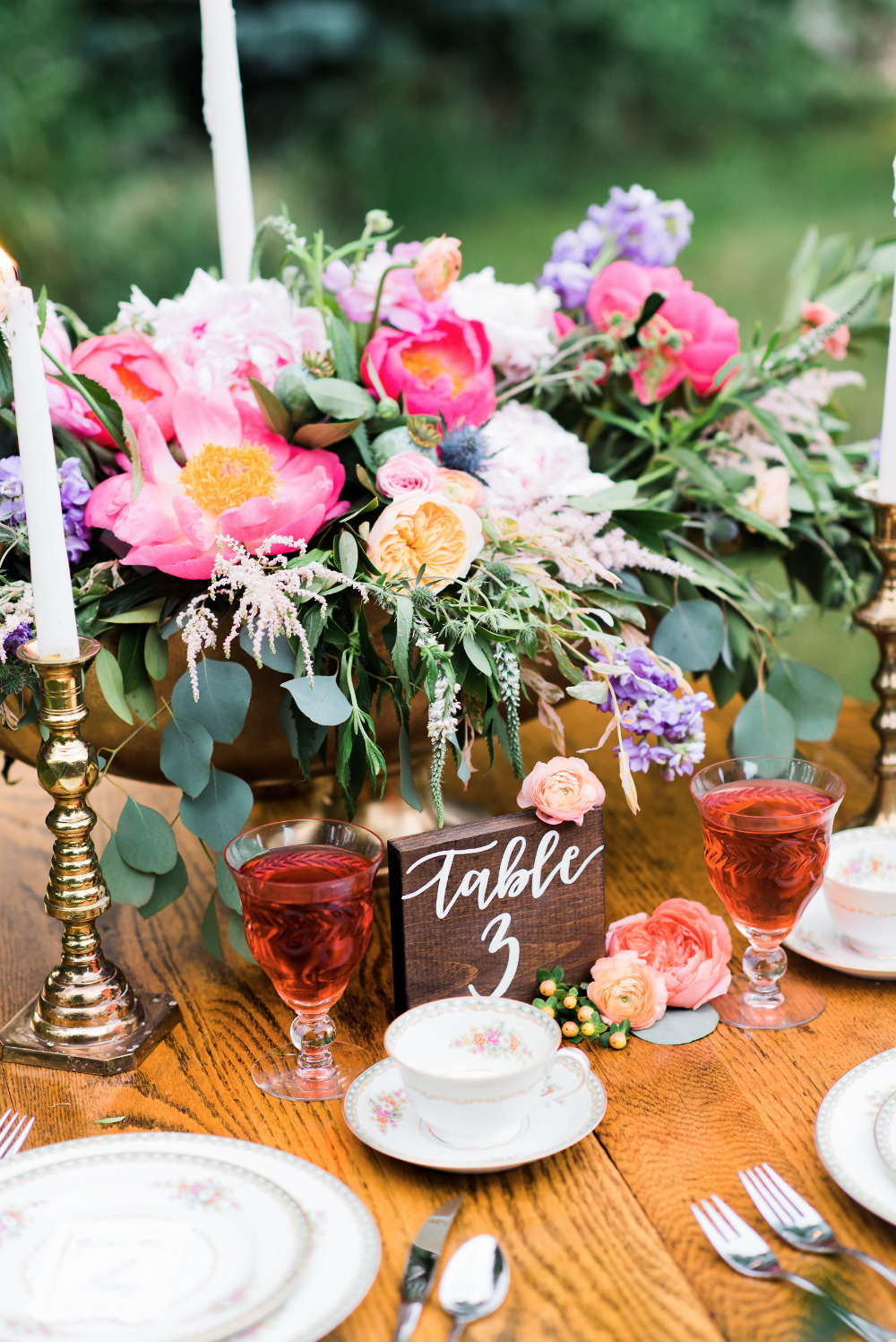 pink and purple floral wedding centerpiece