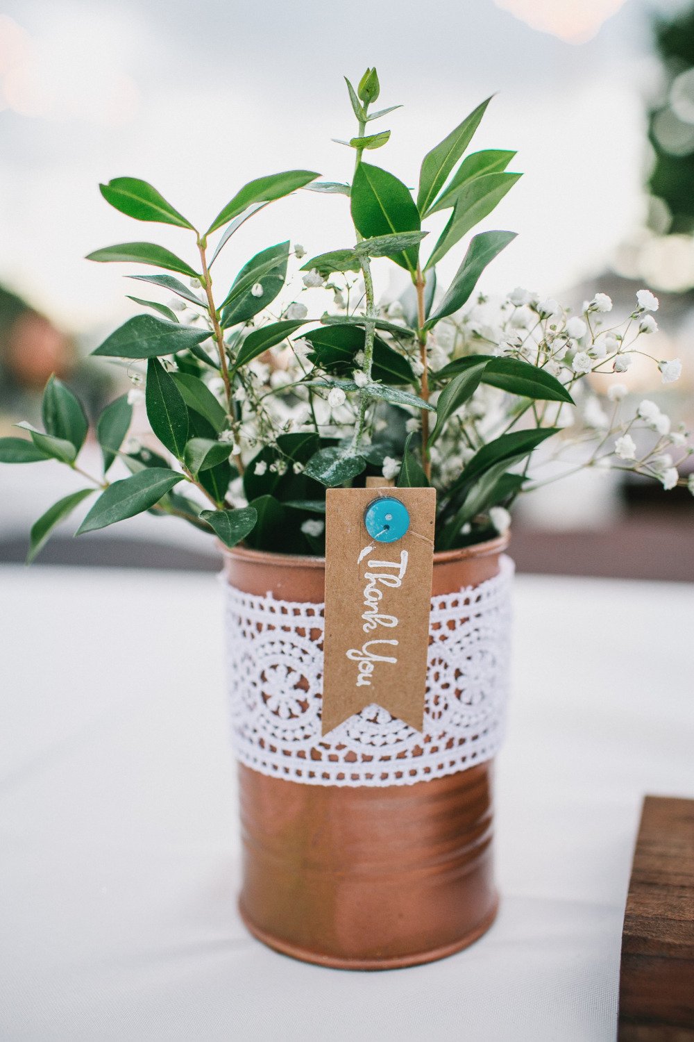 tin can with flowers favor