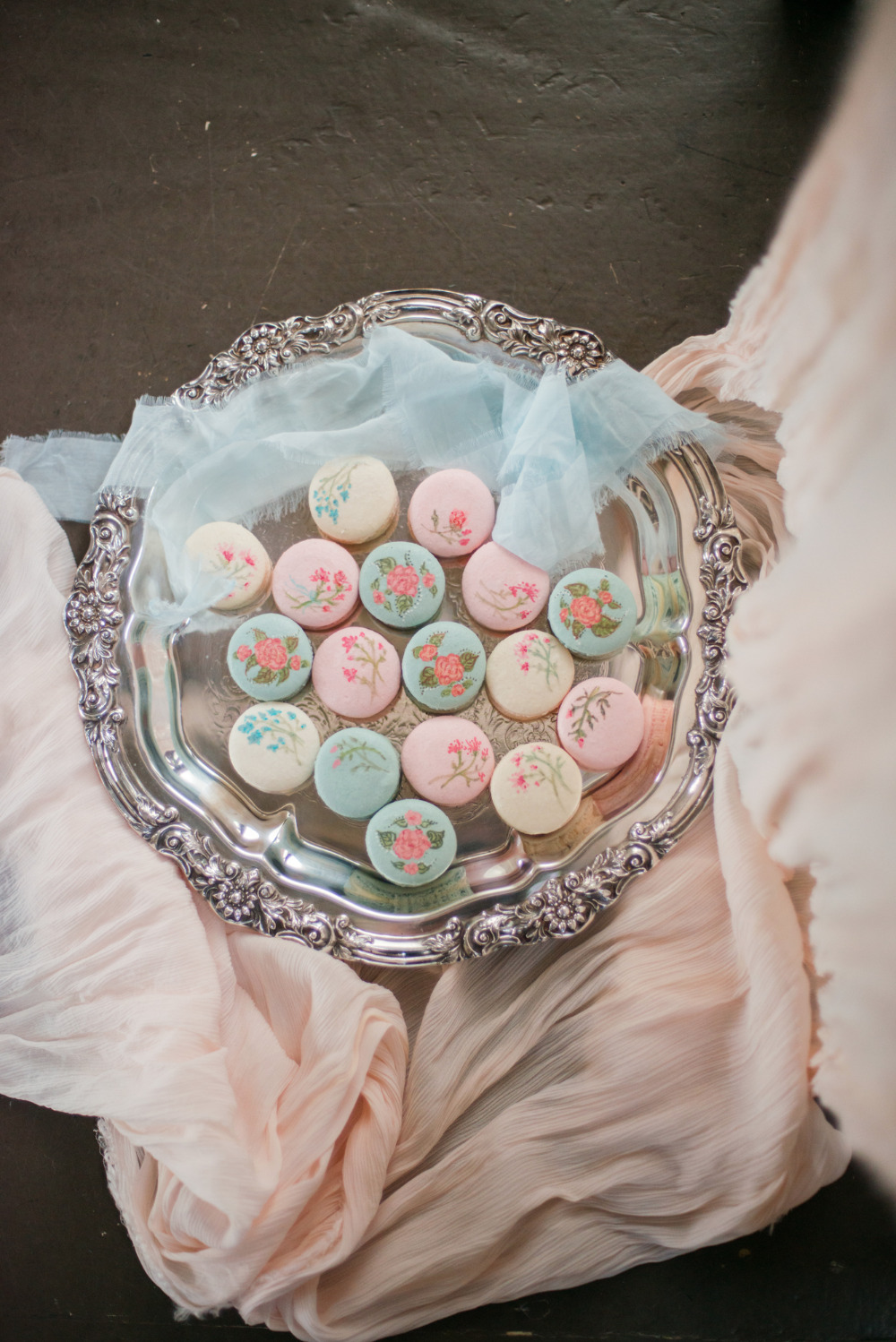 white blue and pink floral macarons