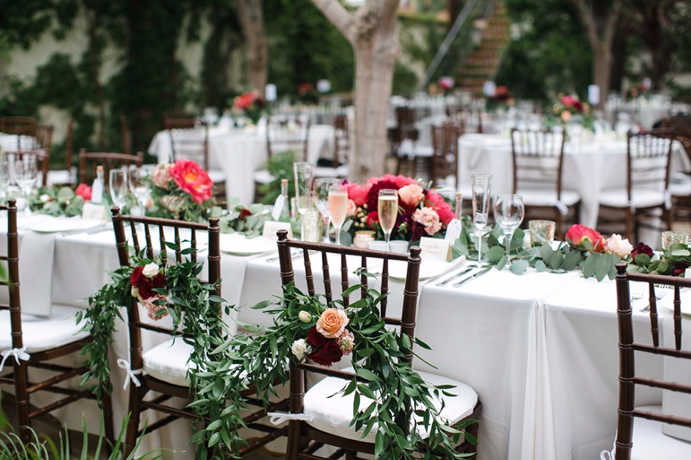 Chair floral decor for bride and groom