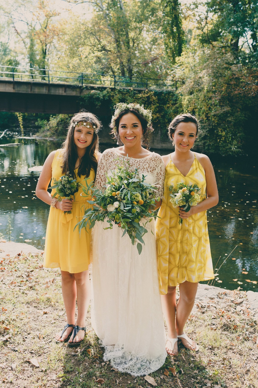 bridesmaids in mismatched yellow dresses