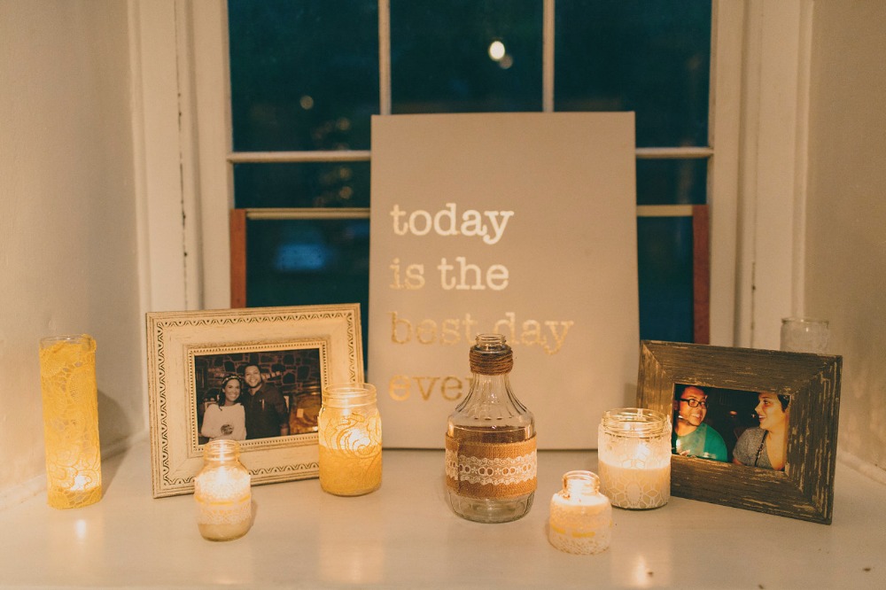 shabby chic wedding decor with candles and pictures