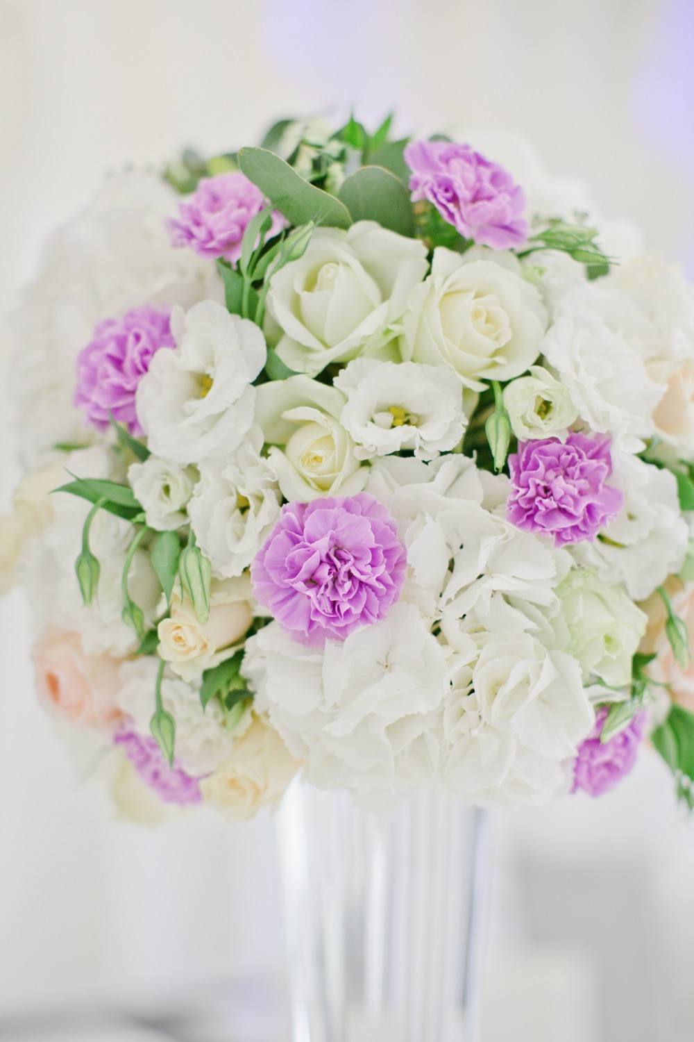 Tall purple and white centerpiece