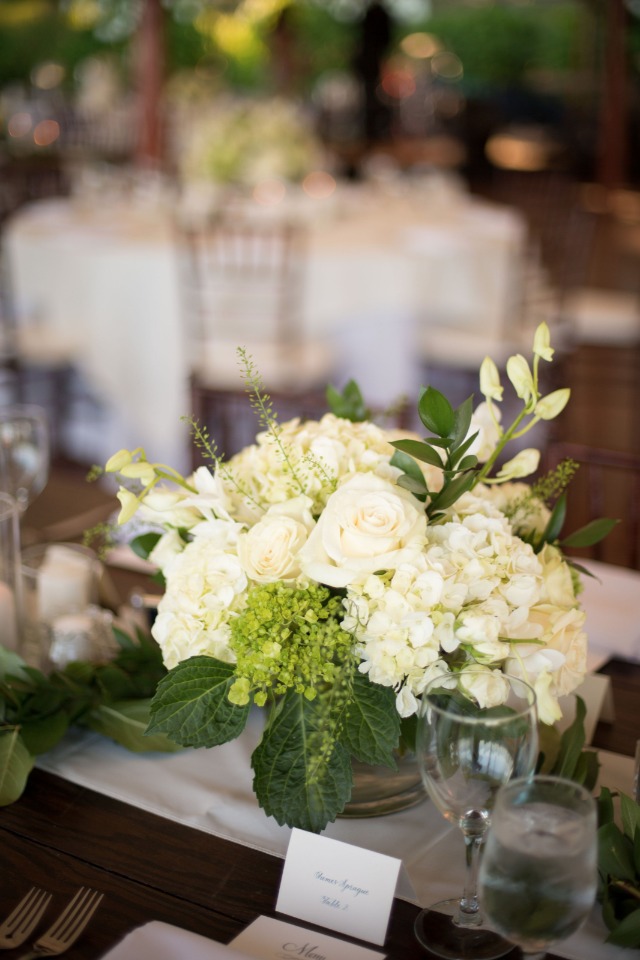 white and green reception centerpiece