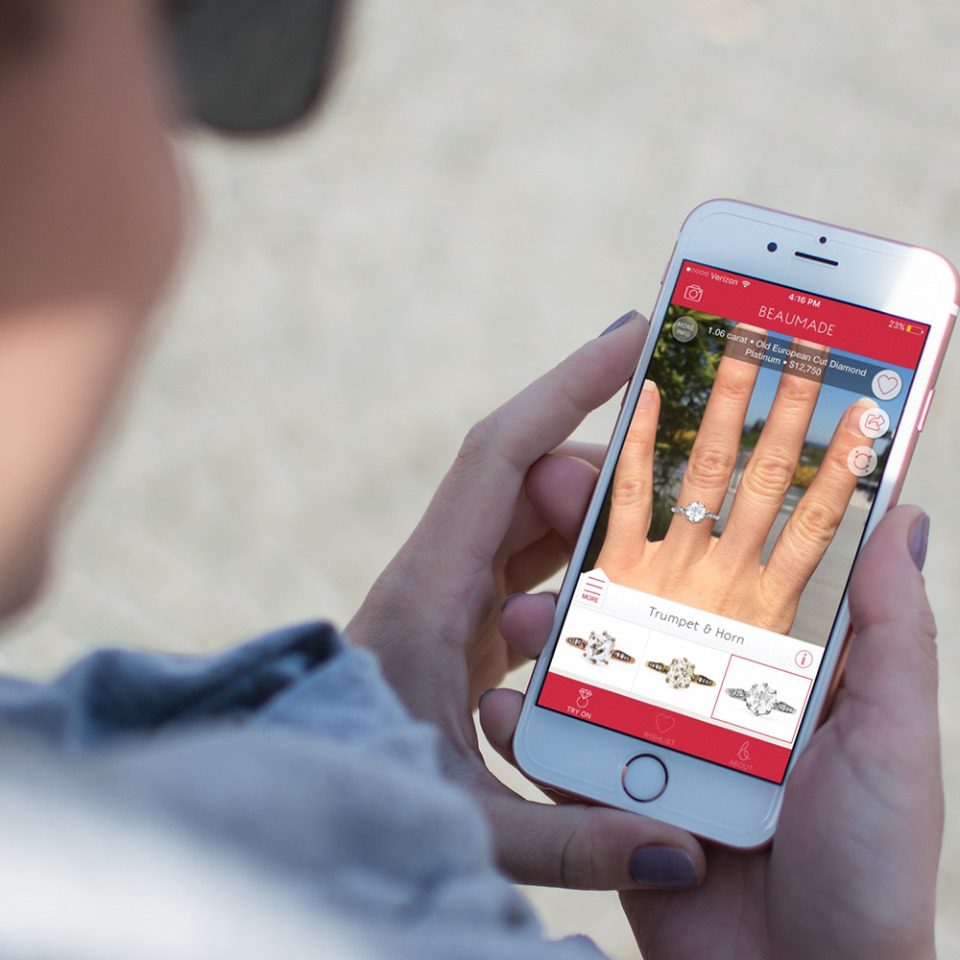 Woman using app to try on engagement rings