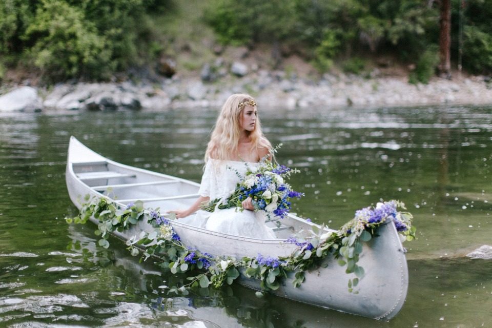 here comes the bride in a canoe