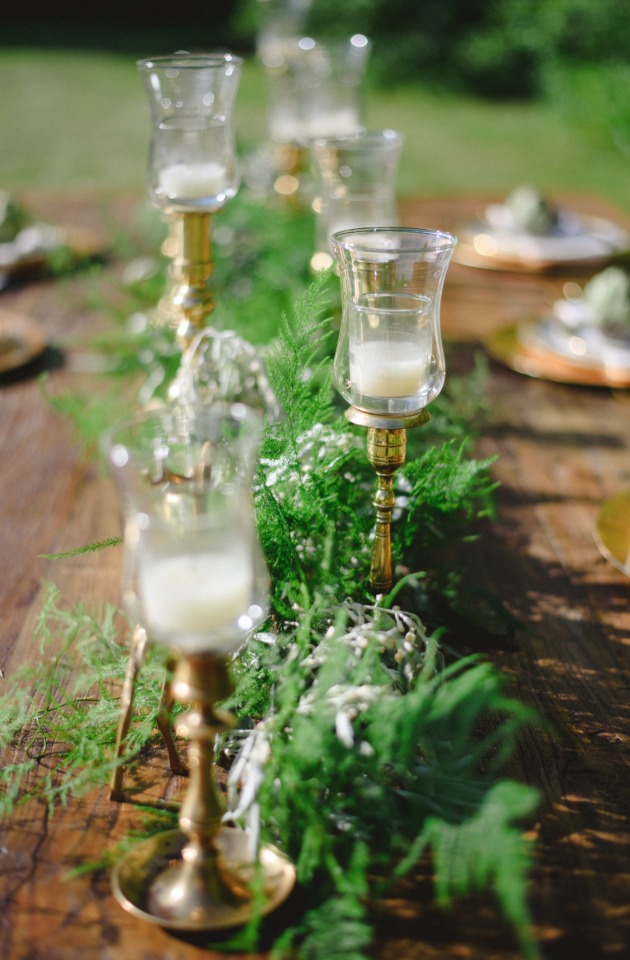 greenery garland and candle table centerpiece