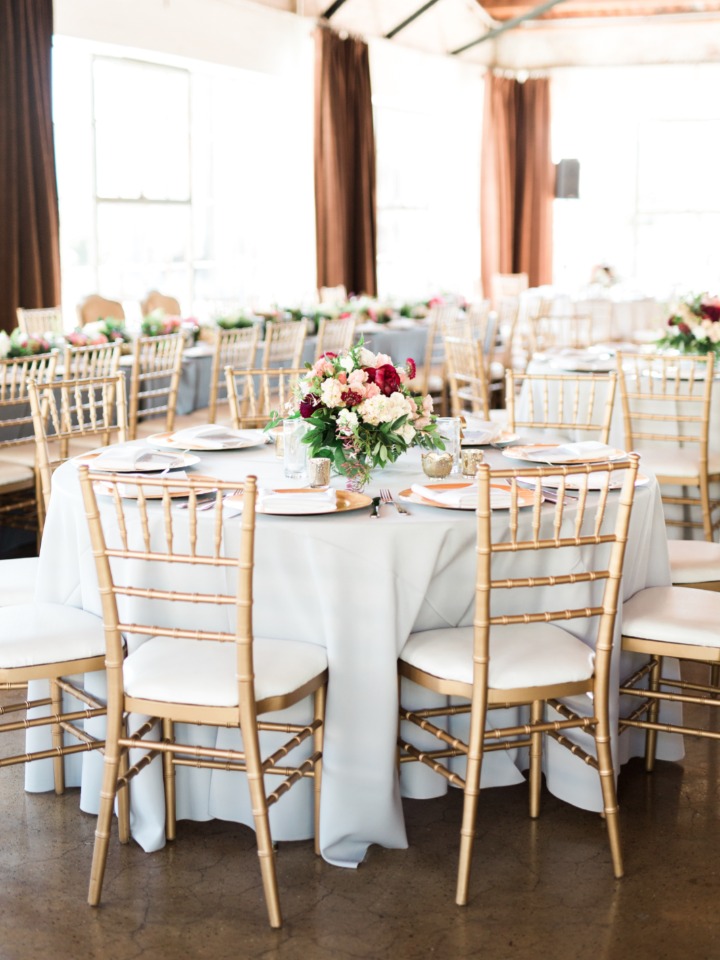 wedding reception decor in blue white and gold
