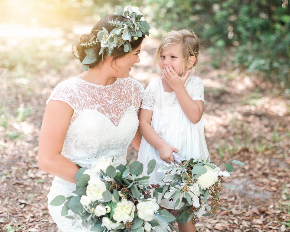 bride and her cute little flower girl