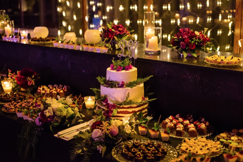 so many sweets options at this glam candle lit cake table