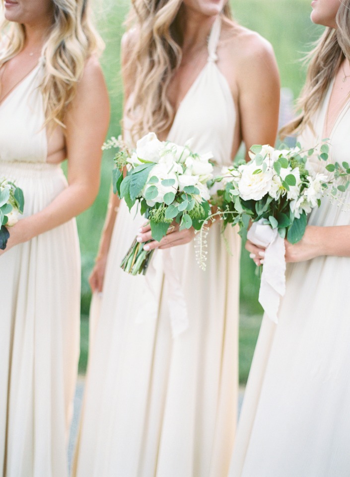 white bouquets for bridesmaids