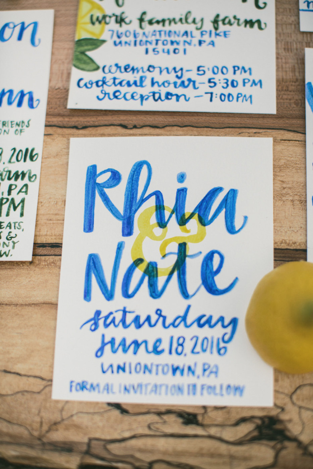 blue and yellow wedding stationery